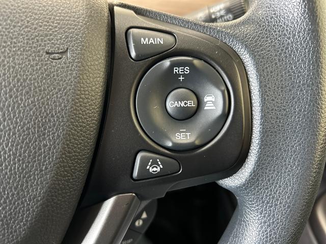 フリードＧ・ホンダセンシング４ＷＤ　オートライト／エアコン　純正ナビ　バックカメラ　ステアリングスイッチ　クルーズコントロール　ＥＣＴ　運転席・助手席シートヒータースイッチ　両側パワースライドドア　純正リモコンエンスタ（秋田県）の中古車