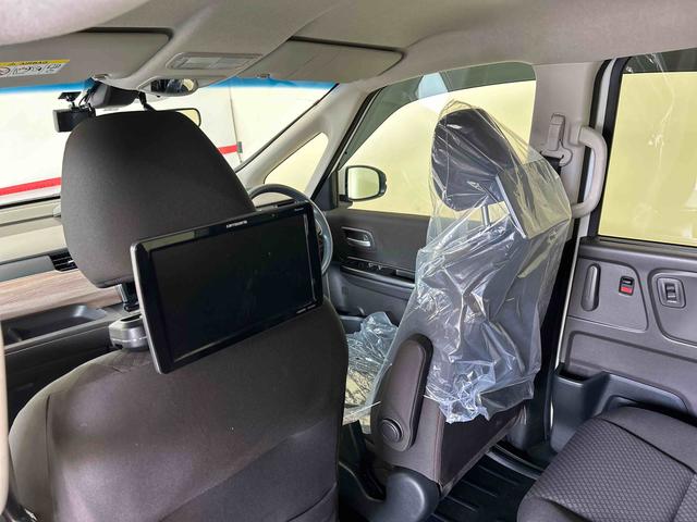 フリードＧ・ホンダセンシング４ＷＤ　オートライト／エアコン　純正ナビ　バックカメラ　ステアリングスイッチ　クルーズコントロール　ＥＣＴ　運転席・助手席シートヒータースイッチ　両側パワースライドドア　純正リモコンエンスタ（秋田県）の中古車