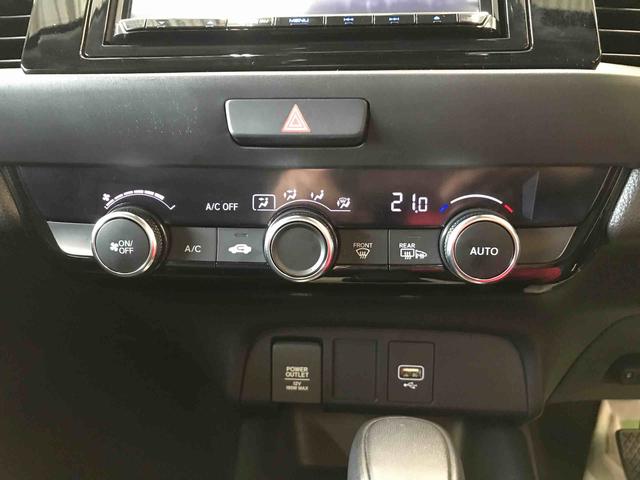 フィットｅ：ＨＥＶホーム４ＷＤ　ナビ　バックカメラ　オートエアコン／ライト　ＬＥＤヘッドライト　電動格納ドアミラー　ドライブレコーダー　クルーズコントロール　ＥＴＣ　チルトステアリング　運転席シートリフター　ホンダセンシング（秋田県）の中古車