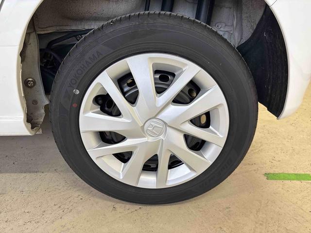 Ｎ−ＢＯＸベースグレード４ＷＤ　ホンダセンシング　社外ナビ　社外ＥＴＣ　オートエアコン／ライト　電動格納ドアミラー　ＬＥＤヘッドライト　クルーズコントロール　チルトステアリング　電動パーキングブレーキ　シートリフター（秋田県）の中古車