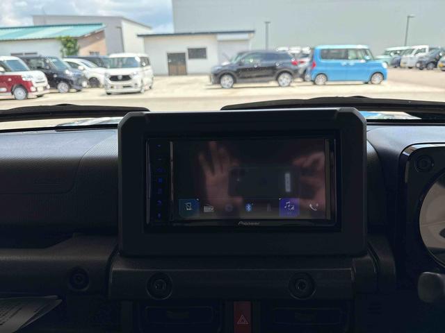 ジムニーシエラＪＬ４ＷＤ　社外ナビ　ハロゲンヘッドライト／フォグランプ　オートエアコン／ライト　ＥＴＣ　電動格納ドアミラー　ＤＡＣ　社外品リモコンエンジンスターター　チルトステアリング　スズキセーフティーサポート（秋田県）の中古車