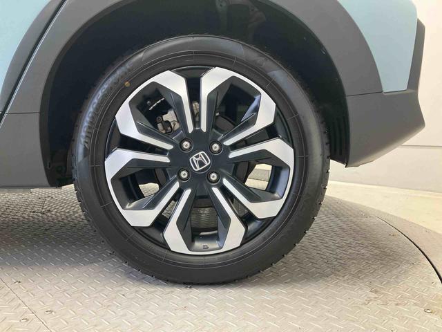 フィットｅ：ＨＥＶクロスターバックカメラ付き　オートエアコン　オートライト　キーフリー（熊本県）の中古車