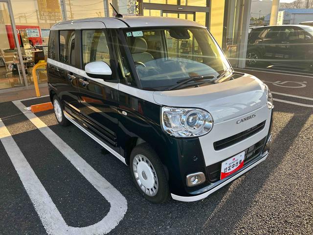 ムーヴキャンバスストライプスGインパネシフト プッシュスタートスイッチ 電子カードキー 電動パーキングブレーキ 両側パワースライドドア 前後誤発進抑制 車線逸脱警告 オートハイビーム ABS シートヒーター(鹿児島県)の中古車