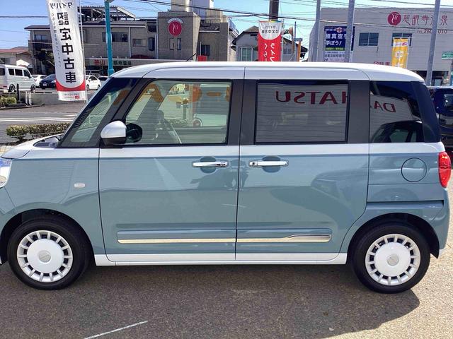 ムーヴキャンバスストライプスGターボターボ車 インパネシフト プッシュスタートスイッチ 電子カードキー 電動パーキングブレーキ 衝突軽減ブレーキ レーンアシスト オートマチックハイビーム ABS 両側パワースライドドア(鹿児島県)の中古車