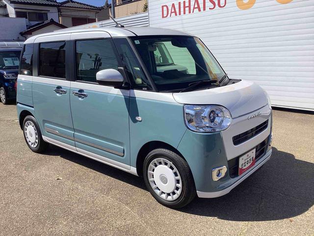 ムーヴキャンバスストライプスGターボターボ車 インパネシフト プッシュスタートスイッチ 電子カードキー 電動パーキングブレーキ 衝突軽減ブレーキ レーンアシスト オートマチックハイビーム ABS 両側パワースライドドア(鹿児島県)の中古車