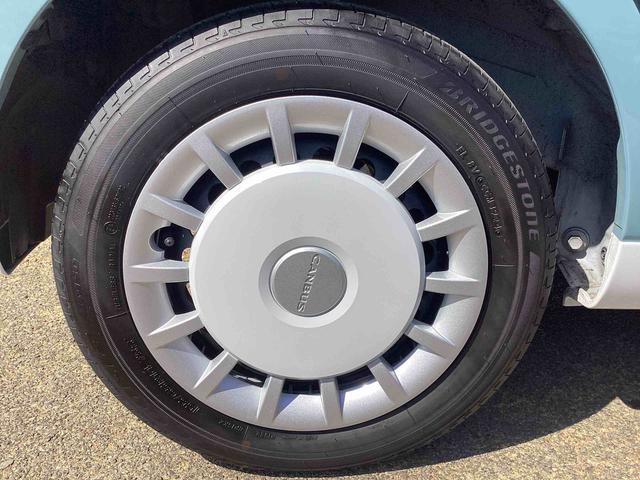 ムーヴキャンバスストライプスGターボターボ車 インパネシフト プッシュスタートスイッチ 電子カードキー 電動パーキングブレーキ 衝突軽減ブレーキ レーンアシスト オートマチックハイビーム ABS 両側パワースライドドア(鹿児島県)の中古車