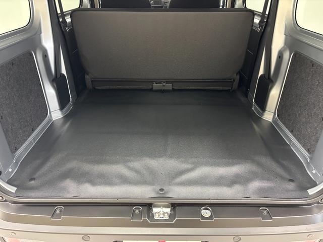 ハイゼットカーゴＤＸＡＭ・ＦＭチューナー　マニュアルエアコン　両側スライドドア　電子制御式４ＷＤ　フルフラット荷室　オーバーヘッドシェルフ　ハロゲンヘッドランプ　オートライト　キーレスエントリー　スマアシ（長野県）の中古車