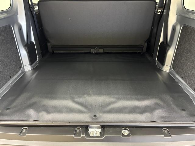 ハイゼットカーゴＤＸＡＭ／ＦＭチューナー　マニュアルエアコン　アクセサリーソケット　電子制御式４ＷＤ　オーバーヘッドシェルフ　フルフラット荷室　ハロゲンヘッドランプ　オートライト機能　キーレスエントリー　スマアシ（長野県）の中古車