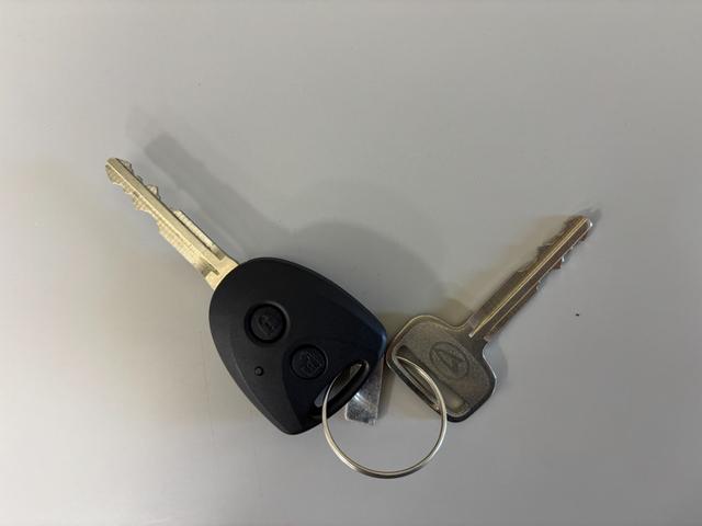 ハイゼットカーゴＤＸＡＭ、ＦＭチューナー　マニュアルエアコン　電子制御式４ＷＤ　両側スライドドア　フルフラット荷室　ハロゲンヘッドランプ　オートライト機能　オーバーヘッドシェルフ　キーレスエントリー　スマアシ（長野県）の中古車