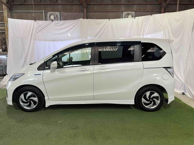フリードハイブリッドジャストセレクション認定中古車　ＣＶＴ　ナビ　バックカメラ　　ＥＴＣ　キーフリーシステム　オートエアコン　ステアリングスイッチ　両側パワースライドドア（香川県）の中古車