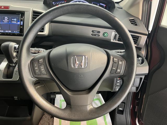 フリードＧ　プレミアムエディション純正ナビ　バックカメラ　フルセグＴＶ　ＣＤ　ＤＶＤ　Ｂｌｕｅｔｏｏｔｈ　クルーズコントロール　ＥＴＣ　後席モニター　両側電動スライドドア　オートライト　電動格納ドアミラー　キーフリーシステム（愛媛県）の中古車