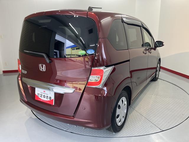 フリードＧ　プレミアムエディション純正ナビ　バックカメラ　フルセグＴＶ　ＣＤ　ＤＶＤ　Ｂｌｕｅｔｏｏｔｈ　クルーズコントロール　ＥＴＣ　後席モニター　両側電動スライドドア　オートライト　電動格納ドアミラー　キーフリーシステム（愛媛県）の中古車