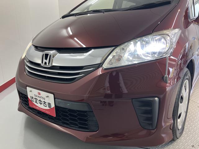 フリードＧ　プレミアムエディション純正ナビ　バックカメラ　フルセグＴＶ　ＣＤ　ＤＶＤ　Ｂｌｕｅｔｏｏｔｈ　クルーズコントロール　ＥＴＣ　後席モニター　両側電動スライドドア　オートライト　電動格納ドアミラー　キーフリーシステム（愛媛県）の中古車