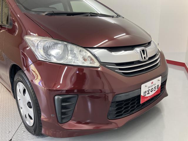 フリードＧ　プレミアムエディション純正ナビ　バックカメラ　フルセグＴＶ　ＣＤ　ＤＶＤ　Ｂｌｕｅｔｏｏｔｈ　クルーズコントロール　ＥＴＣ　後席モニター　両側電動スライドドア　オートライト　電動格納ドアミラー　キーフリーシステム（愛媛県）の中古車