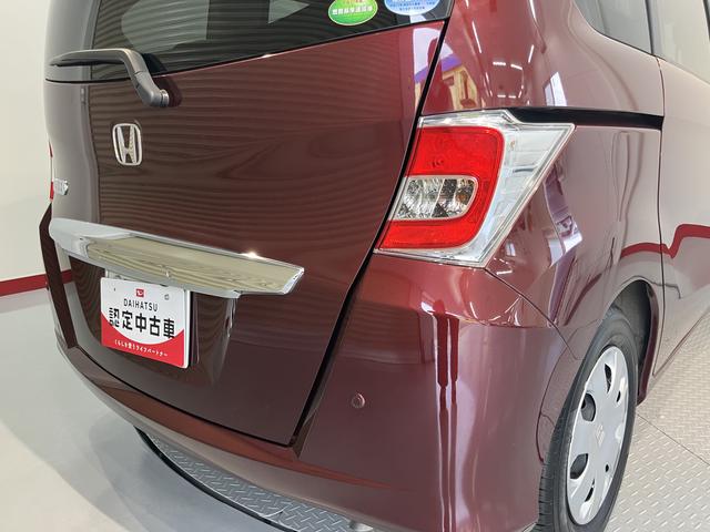 フリードＧ　プレミアムエディション純正ナビ　バックカメラ　フルセグＴＶ　ＣＤ　ＤＶＤ　Ｂｌｕｅｔｏｏｔｈ　クルーズコントロール　ＥＴＣ　後席モニター　両側電動スライドドア　オートライト　電動格納ドアミラー　キーフリーシステム（愛媛県）の中古車