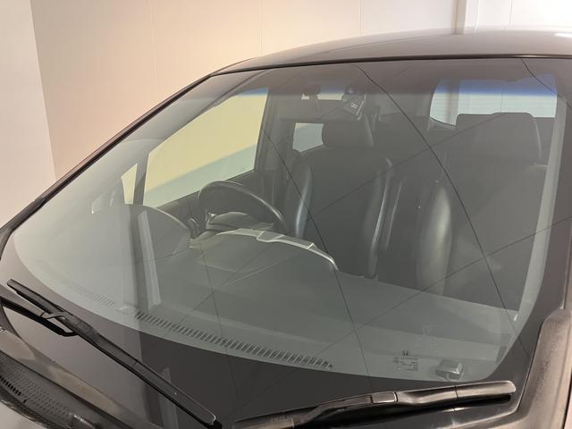 フリードスパイクハイブリッドジャストセレクション＋純正ナビ　バックモニター　フルセグＴＶ　ＣＤ　ＤＶＤ　Ｂｌｕｅｔｏｏｔｈ　ＥＴＣ　両側電動スライドドア　クルーズコントロール　オートライト　ディスチャージヘッドライト　電動格納ドアミラー　キーフリー（愛媛県）の中古車