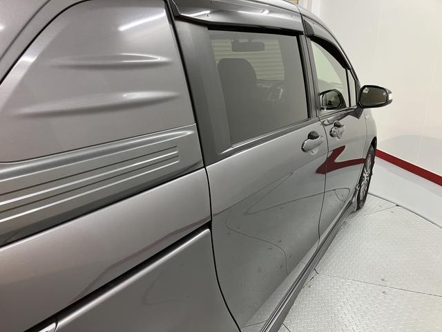 フリードスパイクハイブリッドジャストセレクション＋純正ナビ　バックモニター　フルセグＴＶ　ＣＤ　ＤＶＤ　Ｂｌｕｅｔｏｏｔｈ　ＥＴＣ　両側電動スライドドア　クルーズコントロール　オートライト　ディスチャージヘッドライト　電動格納ドアミラー　キーフリー（愛媛県）の中古車