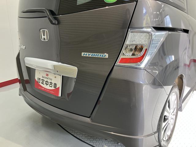 フリードスパイクハイブリッドジャストセレクション＋純正ナビ　バックモニター　フルセグＴＶ　ＣＤ　ＤＶＤ　Ｂｌｕｅｔｏｏｔｈ　ＥＴＣ　両側電動スライドドア　クルーズコントロール　オートライト　ディスチャージヘッドライト　電動格納ドアミラー　キーフリー（愛媛県）の中古車