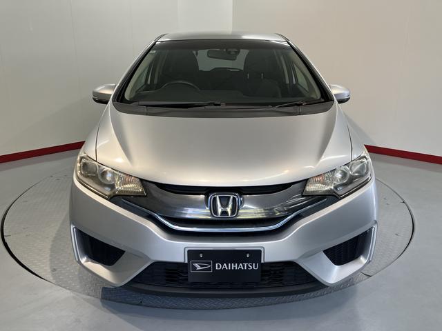 フィットハイブリッドＬパッケージ純正ナビ　ＥＴＣ車載器　バックカメラ　クルーズコントロール　オートエアコン　オートライト　ＬＥＤヘッドライト　電動格納ドアミラー　プッシュスタート　サイドエアバック（愛媛県）の中古車