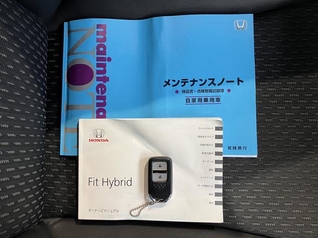 フィットハイブリッドＬパッケージ純正ナビ　ＥＴＣ車載器　バックカメラ　クルーズコントロール　オートエアコン　オートライト　ＬＥＤヘッドライト　電動格納ドアミラー　プッシュスタート　サイドエアバック（愛媛県）の中古車