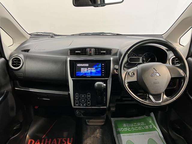 eKカスタムTセーフティパッケージベンチシート アイドリングストップ車 運転席シートヒーター オートライト ディスチャージヘッドライト フロントフォグランプ オートハイビーム 社外メモリーナビ CD DVD USB Bluetooth(愛媛県)の中古車