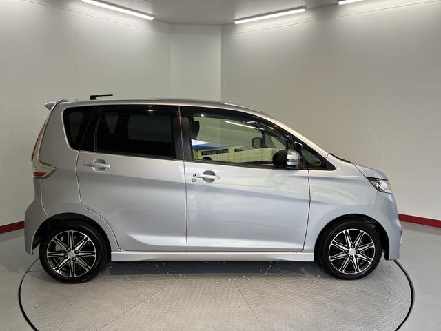 eKカスタムTセーフティパッケージベンチシート アイドリングストップ車 運転席シートヒーター オートライト ディスチャージヘッドライト フロントフォグランプ オートハイビーム 社外メモリーナビ CD DVD USB Bluetooth(愛媛県)の中古車