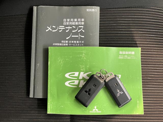 eKカスタムTセーフティパッケージベンチシート アイドリングストップ車 運転席シートヒーター オートライト ディスチャージヘッドライト フロントフォグランプ オートハイビーム 社外メモリーナビ CD DVD USB Bluetooth(愛媛県)の中古車