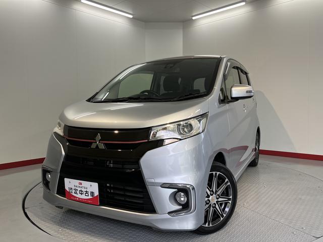 eKカスタムTセーフティパッケージベンチシート アイドリングストップ車 運転席シートヒーター オートライト ディスチャージヘッドライト フロントフォグランプ オートハイビーム 社外メモリーナビ CD DVD USB Bluetooth(愛媛県)の中古車