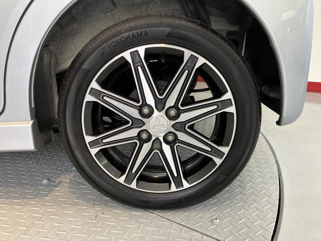 eKカスタムTセーフティパッケージベンチシート アイドリングストップ車 運転席シートヒーター オートライト ディスチャージヘッドライト フロントフォグランプ オートハイビーム 社外メモリーナビ CD DVD USB Bluetooth(愛媛県)の中古車