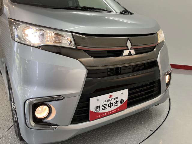 eKカスタムTセーフティパッケージベンチシート アイドリングストップ車 運転席シートヒーター オートライト ディスチャージヘッドライト フロントフォグランプ オートハイビーム 社外メモリーナビ CD DVD USB Bluetooth(愛媛県)の中古車