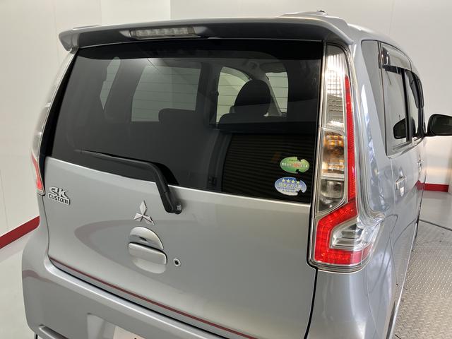 eKカスタムTセーフティパッケージベンチシート アイドリングストップ車 運転席シートヒーター オートライト ディスチャージヘッドライト フロントフォグランプ オートハイビーム 社外メモリーナビ CD DVD USB Bluetooth(愛媛県)の中古車