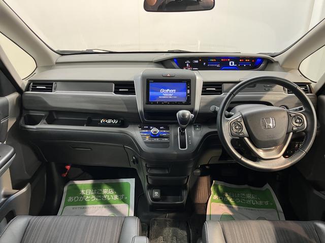 フリードG・ホンダセンシング純正ナビ バックモニター フルセグTV CD DVD Bluetooth 後席モニター ドラレコ ETC 両側電動スライドドア クルーズコントロール オートライト LEDヘッドライト プッシュスタート(愛媛県)の中古車