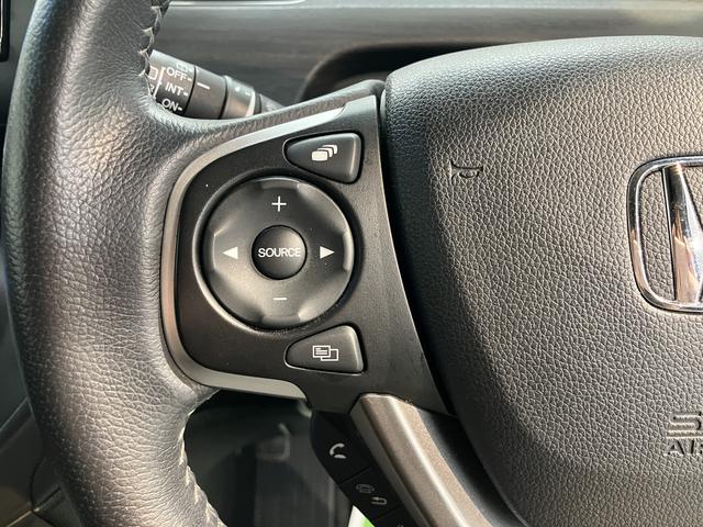 フリードG・ホンダセンシング純正ナビ バックモニター フルセグTV CD DVD Bluetooth 後席モニター ドラレコ ETC 両側電動スライドドア クルーズコントロール オートライト LEDヘッドライト プッシュスタート(愛媛県)の中古車