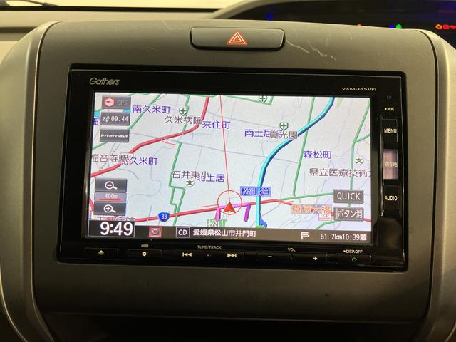 フリードG・ホンダセンシング純正ナビ バックモニター フルセグTV CD DVD Bluetooth 後席モニター ドラレコ ETC 両側電動スライドドア クルーズコントロール オートライト LEDヘッドライト プッシュスタート(愛媛県)の中古車