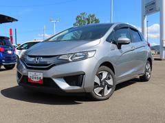 フィットハイブリッドＦパッケージ２ＷＤ　１５００ｃｃ　ハイブリッド　ナビ　バックモニター　ワンセグＴＶ　オートエアコン　アームレストコンソール　横滑り防止装置　ＡＢＳ　運転席・助手席エアバッグ　スマートキー　車検整備付