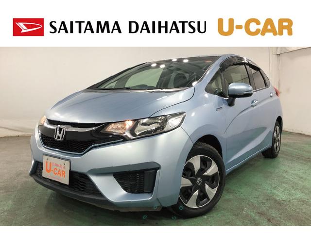 フィットハイブリッドFパッケージ 走行52471キロ/ワンセグナビ/バックカメラ1年保証距離無制限 走行距離52471キロ ワンセグナビ バックカメラ ブルートゥース 純正マット サイドエアバッグ 電動格納式ドアミラー プッシュスタート(埼玉県)の中古車