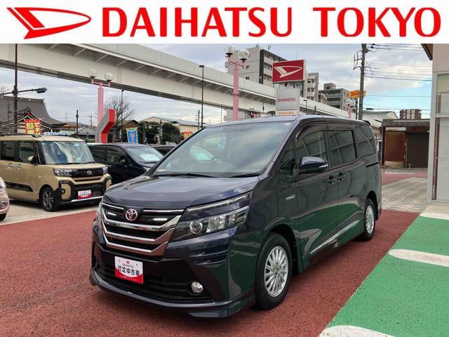 ヴォクシーハイブリッドV 9インチナビ バックカメラ ETC フルセグ保証1年間・距離無制限付き 後席モニター リヤオートエアコン シートヒーター Bluetoothオーディオ DVD再生 CD再生 7人乗りクルーズコントロール スマートキー 電動格納ミラー(東京都)の中古車