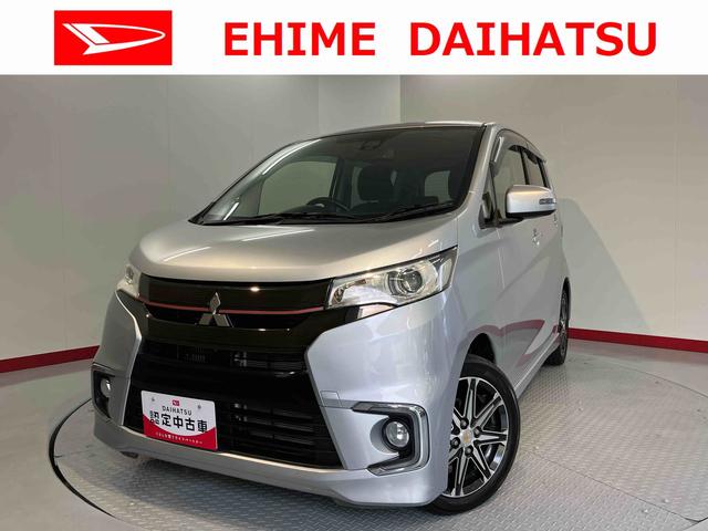 eKカスタムTセーフティパッケージベンチシート アイドリングストップ車 運転席シートヒーター オートライト ディスチャージヘッドライト フロントフォグランプ オートハイビーム 社外メモリーナビ CD DVD USB Bluetooth(愛媛県)の中古車