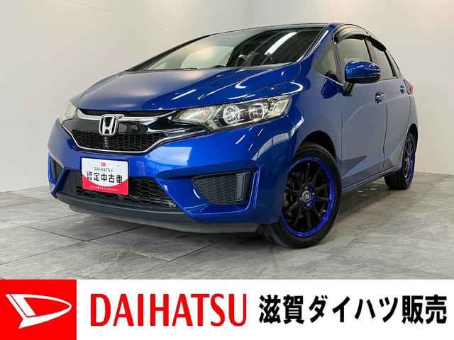 フィット１３Ｇ・Ｆパッケージ　ワンセグナビ　バックカメラ　車検整備付ワンセグナビ　バックカメラ　ＤＶＤ再生　ＵＳＢ　ＥＴＣ　社外アルミ　ＬＥＤ　オートライト　オートエアコン　スマートキー　電動格納式ミラー　エコアイドル（滋賀県）の中古車