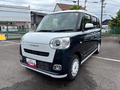 ムーヴキャンバス 中古車 ストライプスＧ１４インチフルホイールキャップ　ＬＥＤヘッドランプ　ＬＥＤフォグランプ　ホっとカップホルダー　両側パワースライドドア　キーフリーシステム　プッシュボタンスタート　ＵＶカットガラス