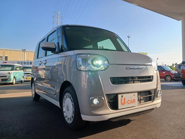ムーヴキャンバスストライプスGターボ/純正ナビ/デモカーUP/バックカメラ付1年保証距離無制限 走行距離1987キロ カーナビ サイドエアバッグ LEDヘッドランプ アイドリングストップ シートヒーター 両側電動スライドドア オート格納式ドアミラー 電動パーキングブレーキ(埼玉県)の中古車