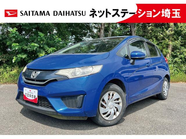 フィット13G・Lパッケージ 現状販売車/ルーフ色あせ/シート穴【現状販売車】保証1年間・距離無制限付き 純正ナビ オートエアコン キーフリー 純正フロアマット アイドリングストップ 純正リアスモークガラス(埼玉県)の中古車